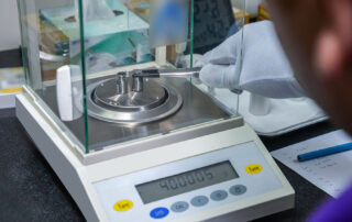 a person calibrating a scale